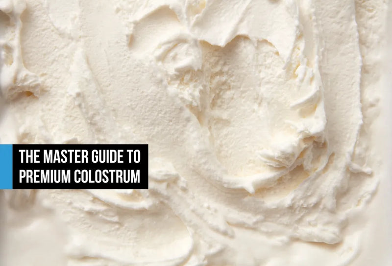 Fine organic grass-fed bovine colostrum powder in soft white tones, resembling premium vanilla whey, suggesting clean cold-processed sourcing and biological purity