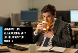 Young professional man at his desk gripping a coffee cup with visible tension and anxiety — illustrating overstimulation and nervous system strain from too much caffeine.