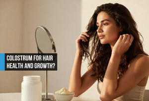 Woman with thick healthy hair admiring results of daily bovine colostrum routine for hair growth support