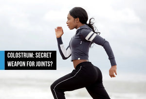 Athletic woman sprinting outdoors in workout gear, with text overlay reading Colostrum Secret Weapon for Joints?