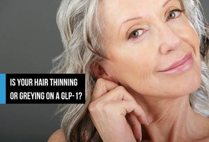 A smiling older woman with wavy grey hair touching the side of her face, against a soft grey background, with overlay text reading 