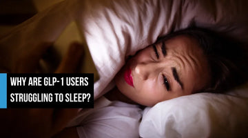 A woman lying awake in bed at night under dim warm light, unable to sleep, with overlay text reading 'Why are GLP-1 users struggling to sleep?'