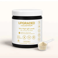 Upgraded Formulas® upgraded colostrum supplement showing a bottle of health-boosting colostrum capsules on a neutral background.